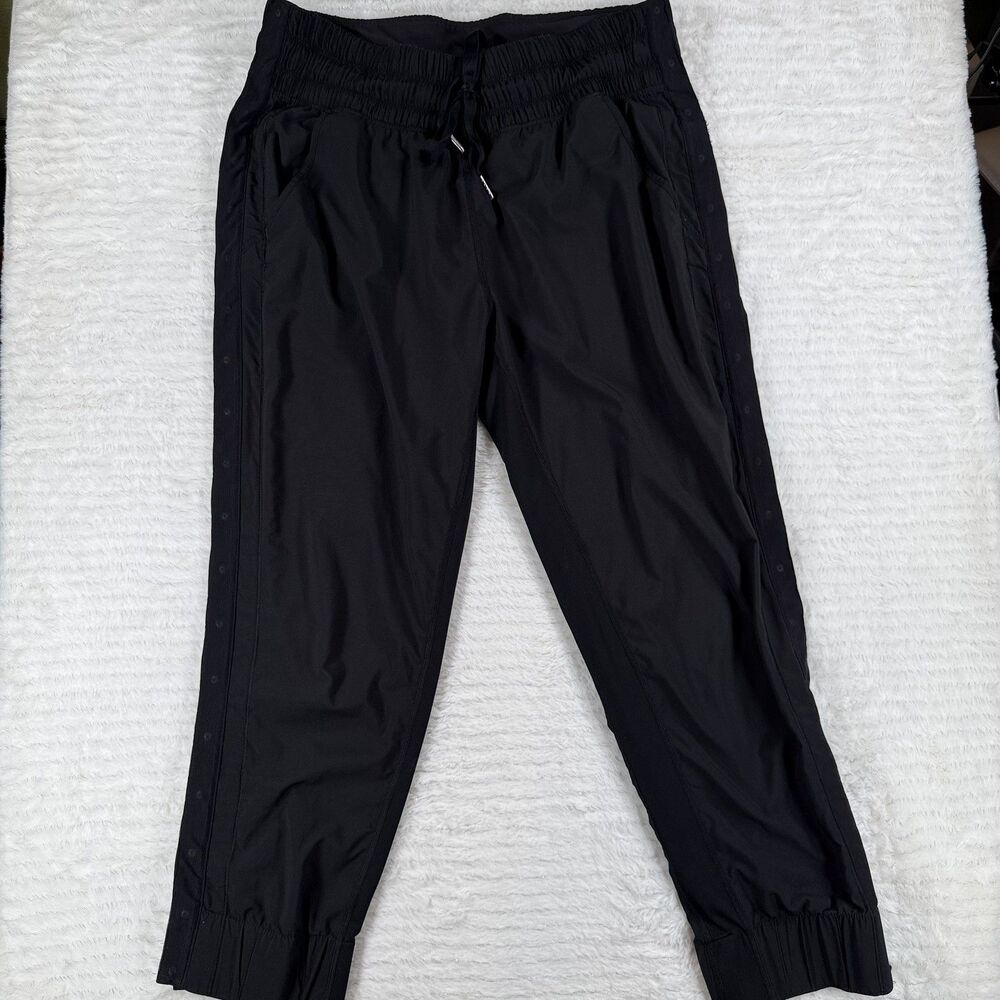 Lululemon Black Tear Away Snap Button Sides Track Pants Women’s Size 8 Athletic